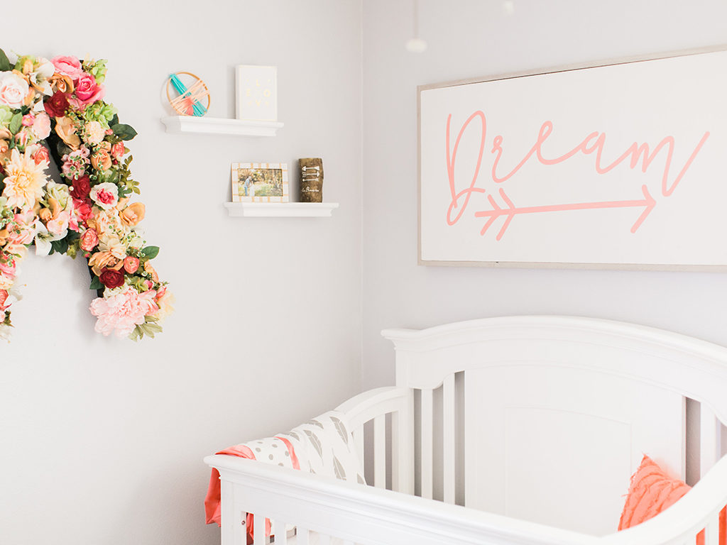 Add color to your nursery with floral accents. Featured here is the Evolur Fairbanks 5-in-1 Convertible Crib